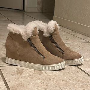 Never Worn. Suede type of material Women’s Sneakers